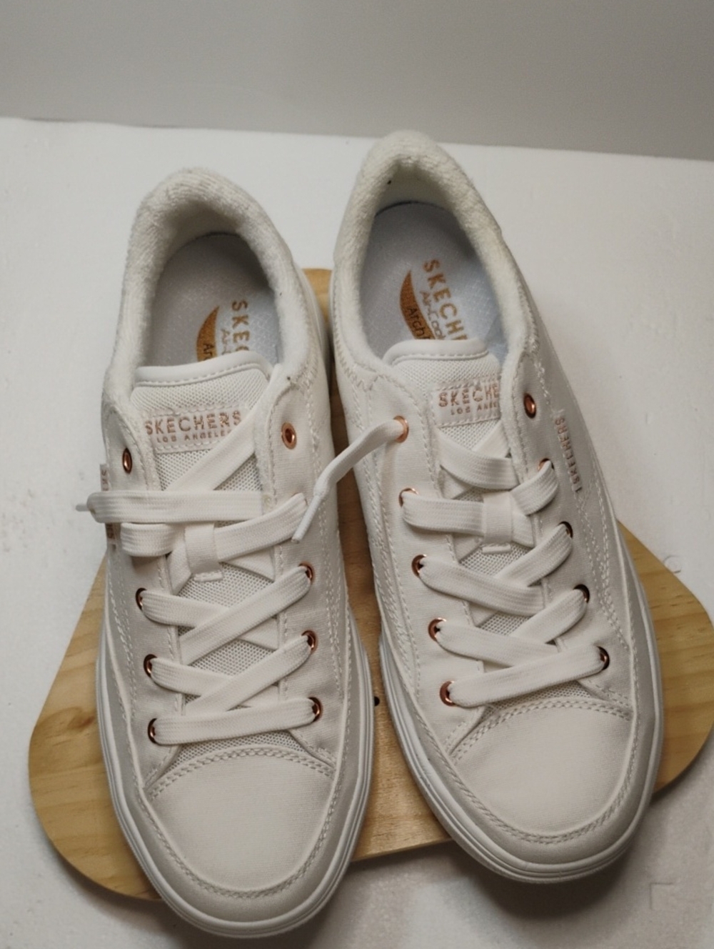 Skechers Women's White Low-Top Sneakers with Rose Gold Eyelets